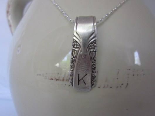 Antique silverware turned into pendants